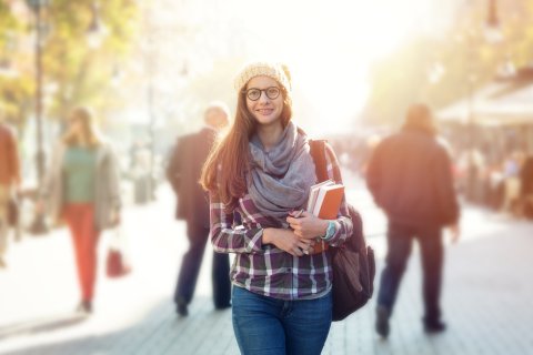 Photograph of young woman on campus