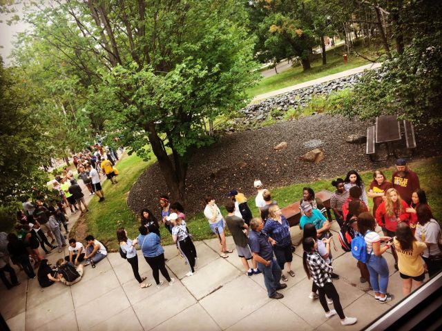 Crowd of new UMD students and their parents outside Heaney Hall for the Free Store